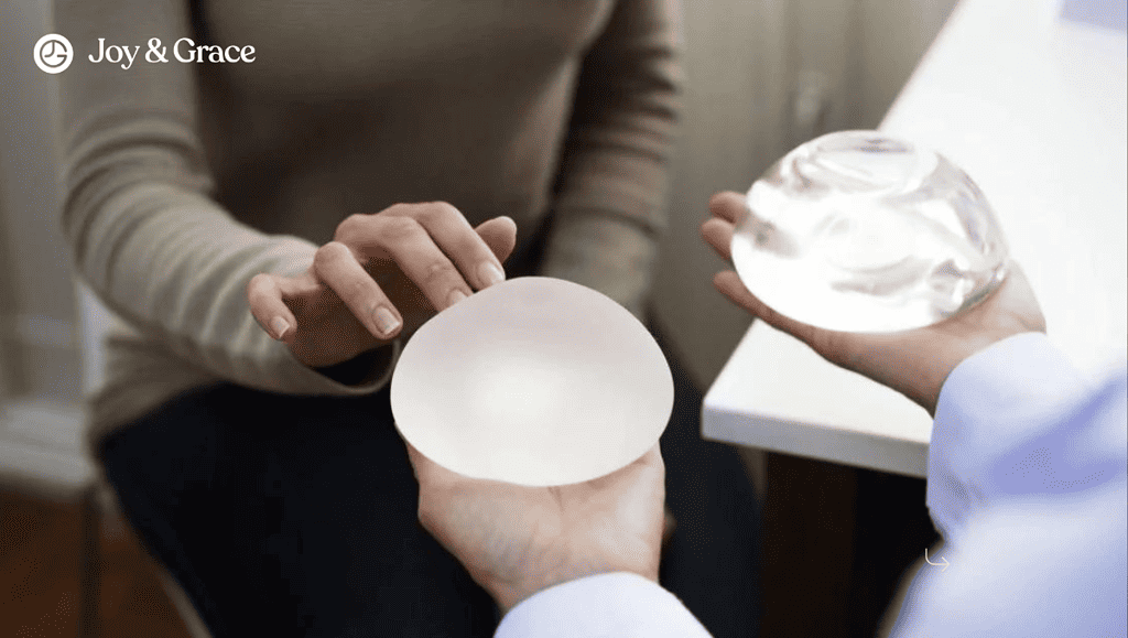 A medical provider showcasing breast implants