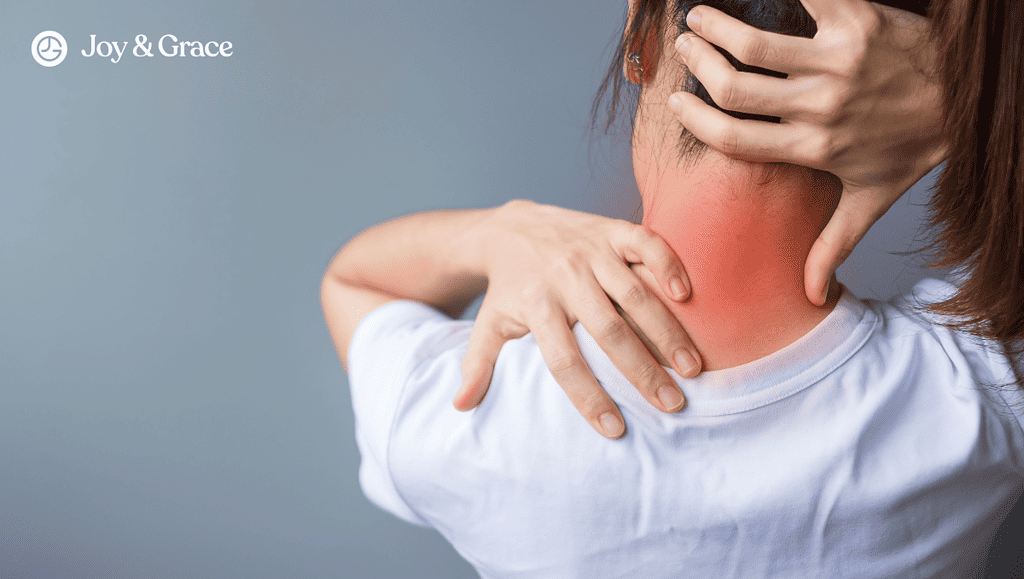 a woman with her hands on the neck pain