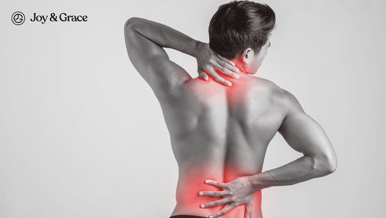 a person touching his pain highlighted shoulder and lower back