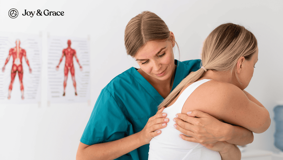 A female healthcare provider examining the back of a female patient