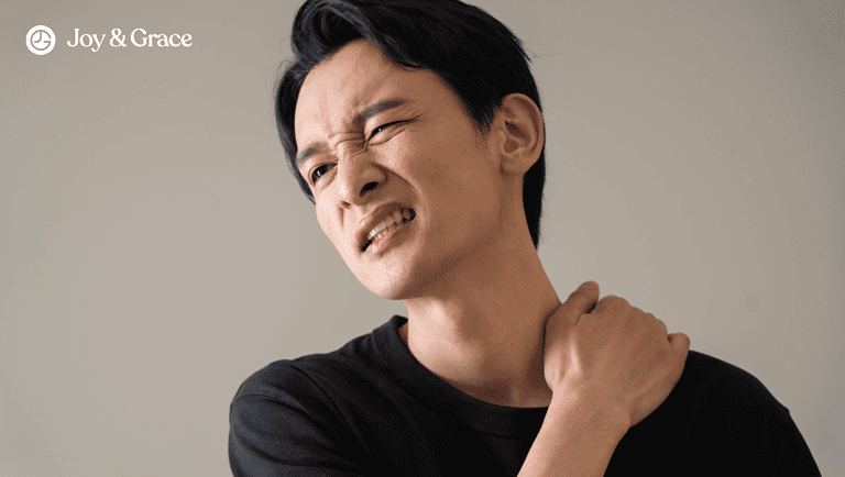 a man with a shoulder pain