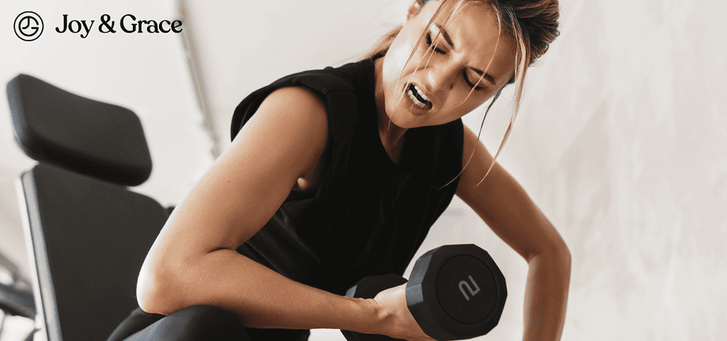 a young woman lifting dumbbells in an exercise room