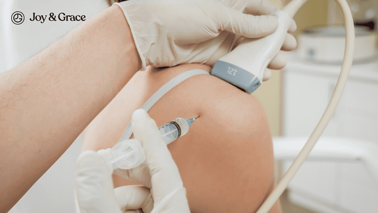 a person getting injection on the shoulder of a woman