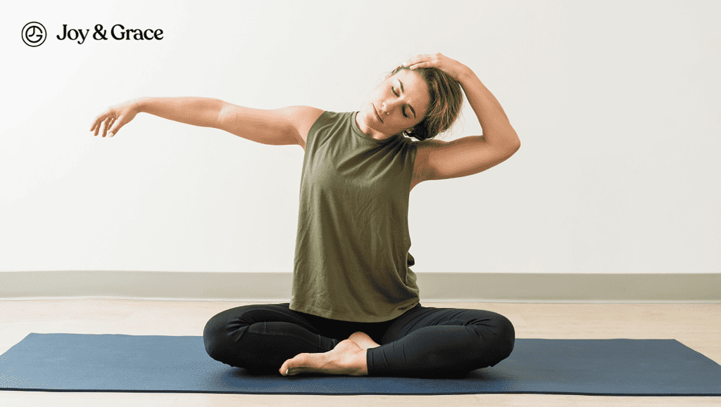 A woman finding effective relief from neck pain and headache through a soothing yoga pose on a mat.