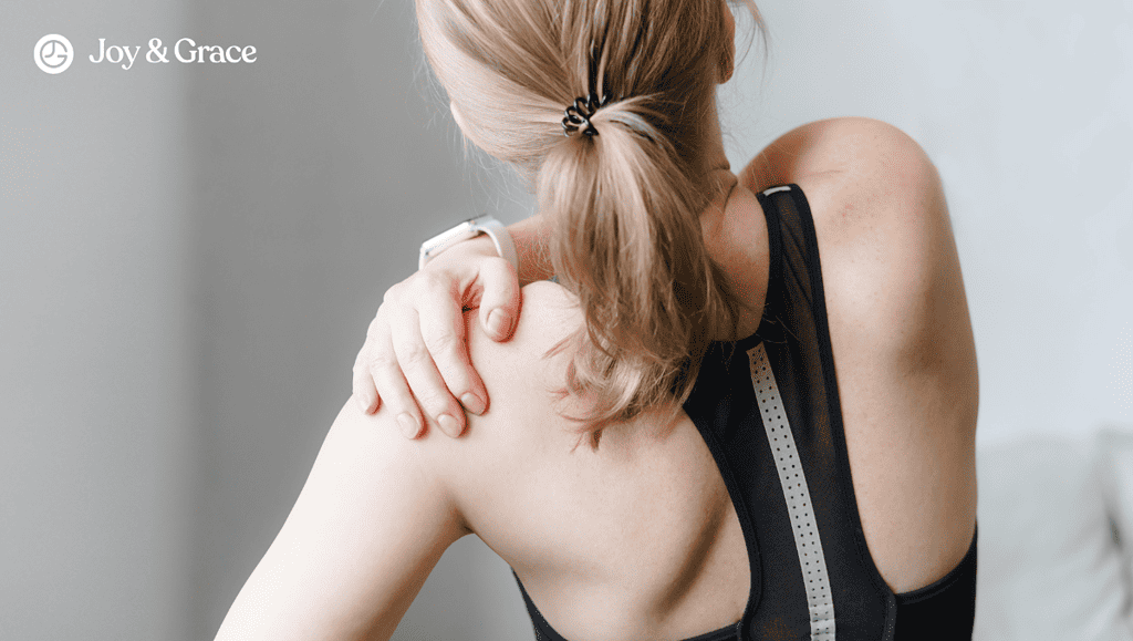 A woman experiences relief from shoulder pain during a massage therapy session.