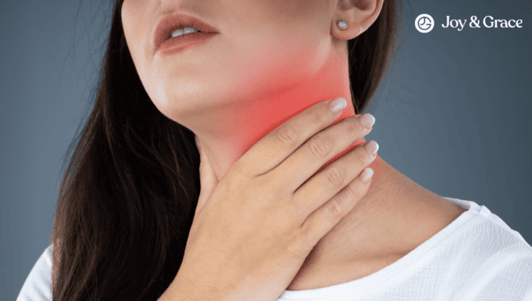 A woman exploring thyroid pain on the right side of her neck.