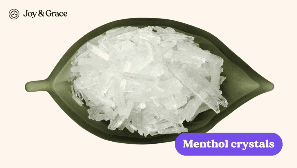 Menthol crystals, relieving neck pain, in a bowl on a white background.