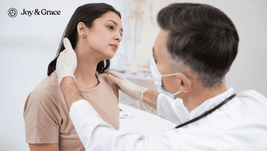 A doctor is examining a woman's neck for shoulder pain.