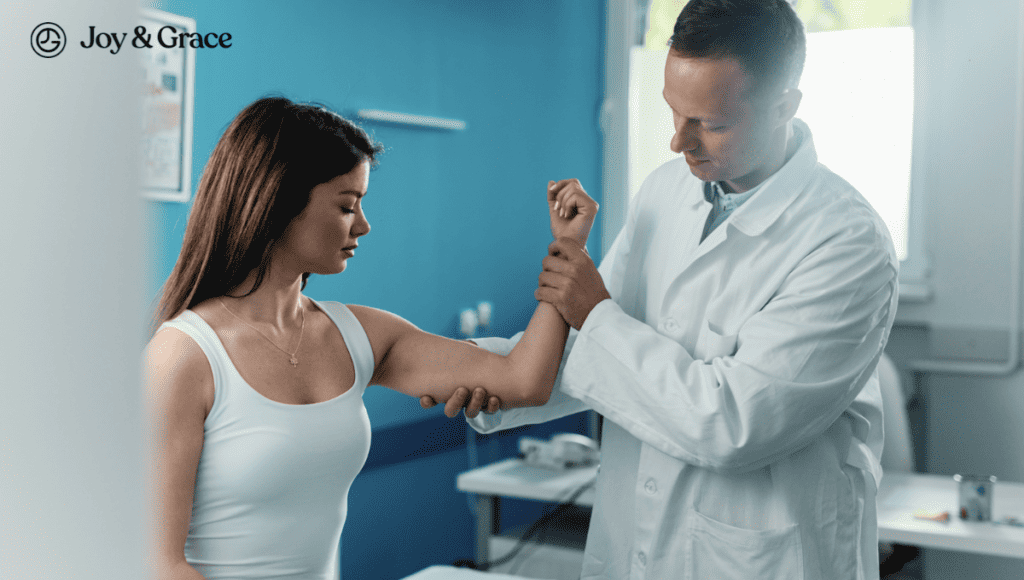 A doctor is examining a woman's arm for tricep pain.