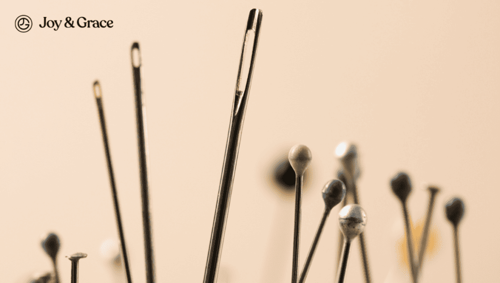 A group of needles on a beige background.