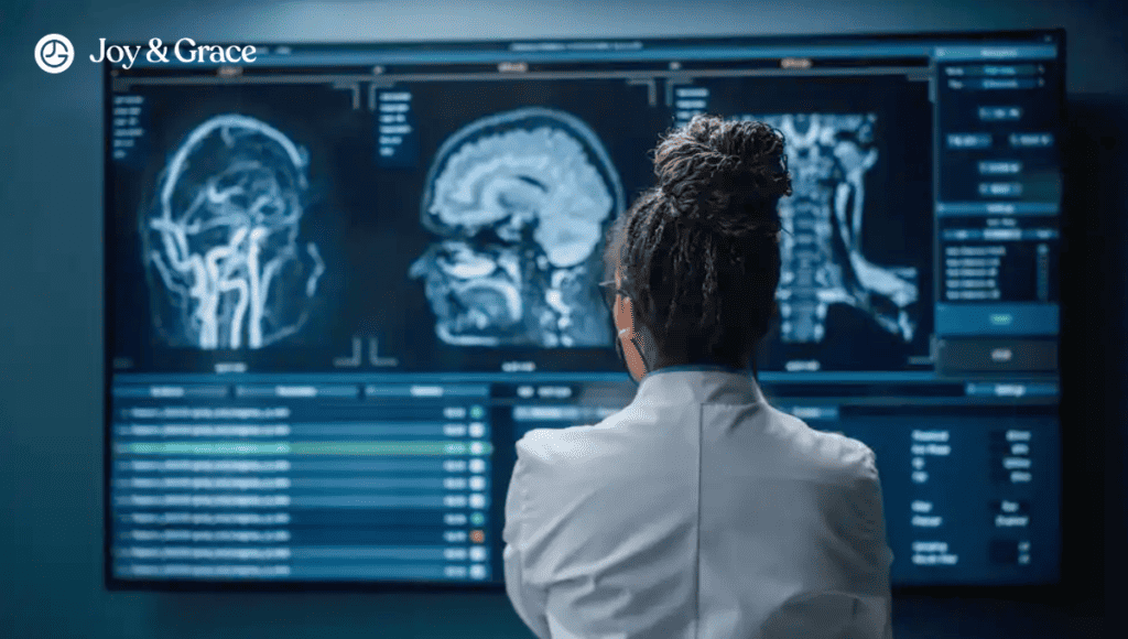 A woman is looking at a MRI of her neck on a TV screen.